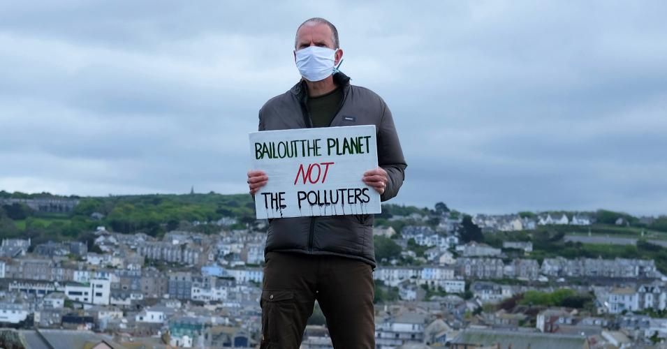 Climate change activists from the group "No Going Back—another world is possible," took part in a social distancing protest on May, 4 2020 in St. Ives, Cornwall, United Kingdom. 