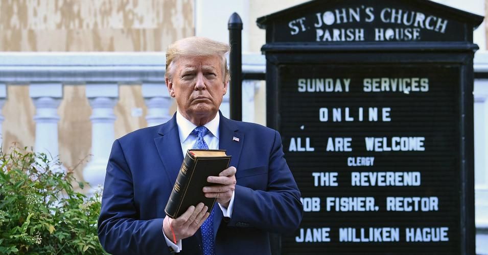 President Donald Trump holds up a Bible outside of St. John's Episcopal church across Lafayette Park in Washington, D.C. on June 1, 2020. 