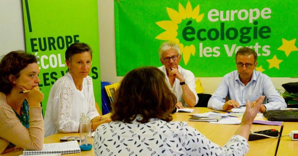 The newly elected mayor of Bordeaux, Pierre Hurmic (R) of the Greens Party, takes part in a meeting with members of his campaign team on June 29, 2020, a day after the second round of the French mayoral elections.