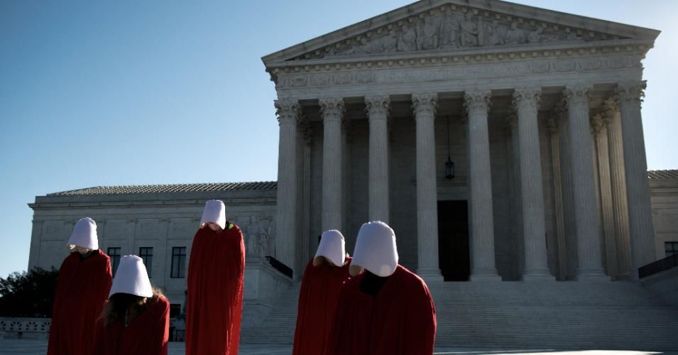 Demonstrators from the Center for Popular Democracy Action stand on the U.S. Supreme Court steps dressed in Handmaids Tale costumes to voice opposition to Judge Amy Coney Barretts nomination to the court on September 30, 2020. (Photo: Caroline Brehman/CQ-Roll Call, Inc via Getty Images)