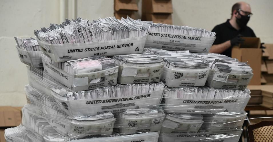 Mail-in ballots in their envelopes await processing at the Los Angeles County Registrar Recorders' mail-in ballot processing center at the Pomona Fairplex in Pomona, California, on October 28, 2020. (Photo: Robyn Beck/AFP via Getty Images)