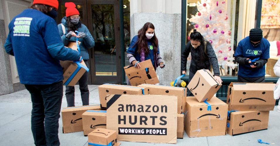 Amazon workers and community allies demonstrate during a protest organized by New York Communities for Change and Make the Road New York in front of the Jeff Bezos' Manhattan residence in New York on December 2, 2020. (Photo: Kena Betancur/AFP via Getty Images)