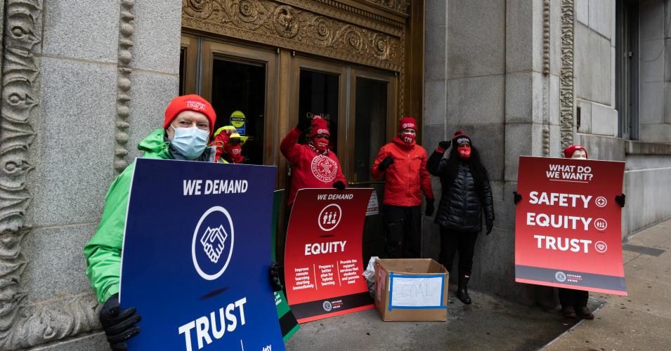 Chicago Teachers Union leadership list their demands and leave a box of coal outside the entrance of City Hall following a car caravan where teachers and supporters demanded a safe and equitable return to in-person learning during the Covid-19 pandemic on December 12, 2020. Select public school teachers are expected to return to classrooms on January 4, 2021. (Photo: Max Herman/NurPhoto via Getty Images)