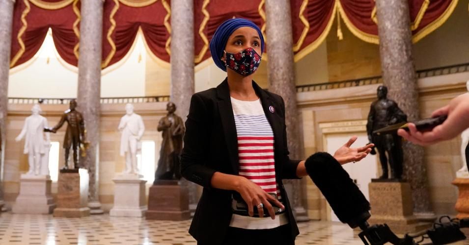 Rep. Ilhan Omar (D-Minn.) speaks to reporters in Statuary Hall on Capital Hill on Tuesday, Jan. 12, 2021 in Washington, D.C.