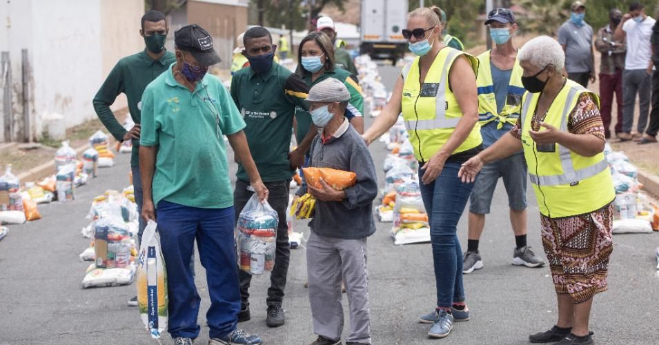 Gift of the Givers distribute food parcels on January 27, 2021 in Touws River, South Africa. Due to the impact of the Covid-19 pandemic and the lockdown restrictions, a reported 93% of the local population is unemployed. (Photo: Brenton Geach/Gallo Images via Getty Images)