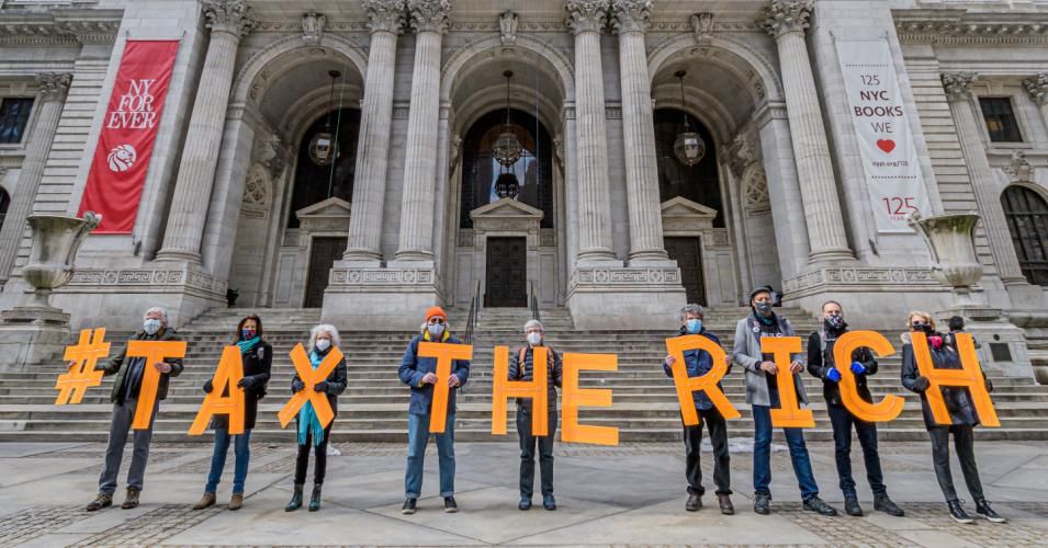Participants seen spelling out #TaxTheRich at the New York Public Library on March 4, 2021 in Manhattan.