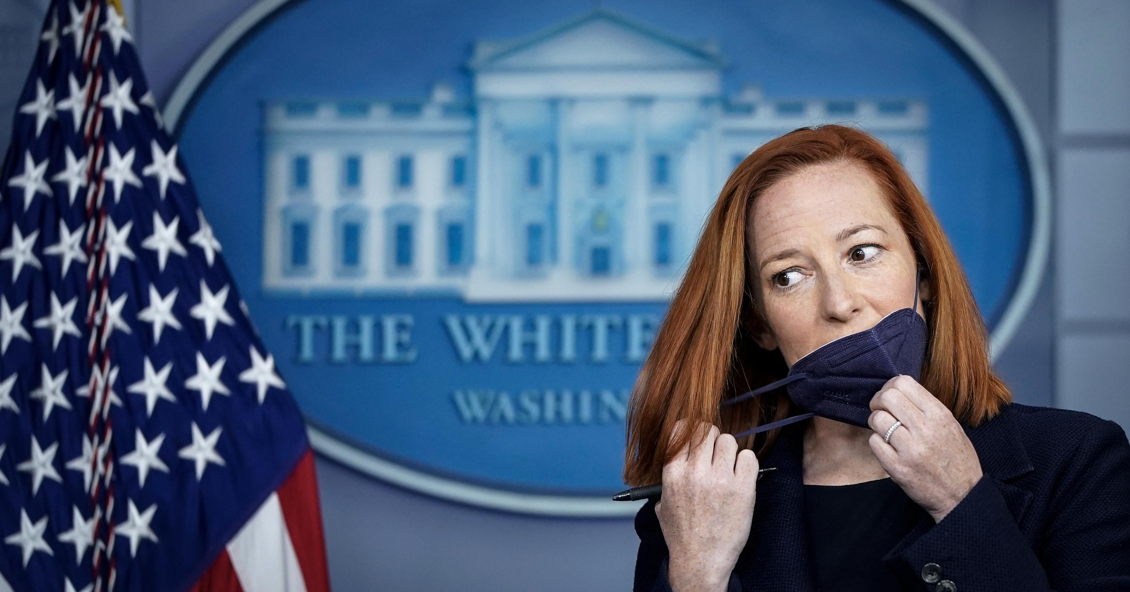 White House Press Secretary Jen Psaki removes her face covering as she arrives for the daily press briefing at the White House on March 29, 2021 in Washington, D.C. (Photo: Drew Angerer/Getty Images)