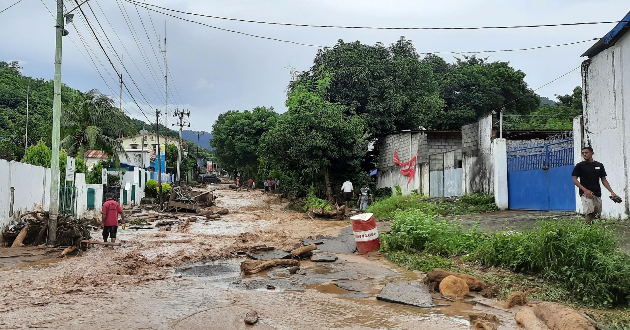 This picture taken on April 5, 2021 shows damaged homes after a flash flood in Waiwerang village, East Flores, as at least 157 people have been killed in Indonesia and neighboring East Timor with dozens more still missing after a tropical cyclone battered the Southeast Asian nations. (Photo: Reynold Atagoran/AFP via Getty Images)