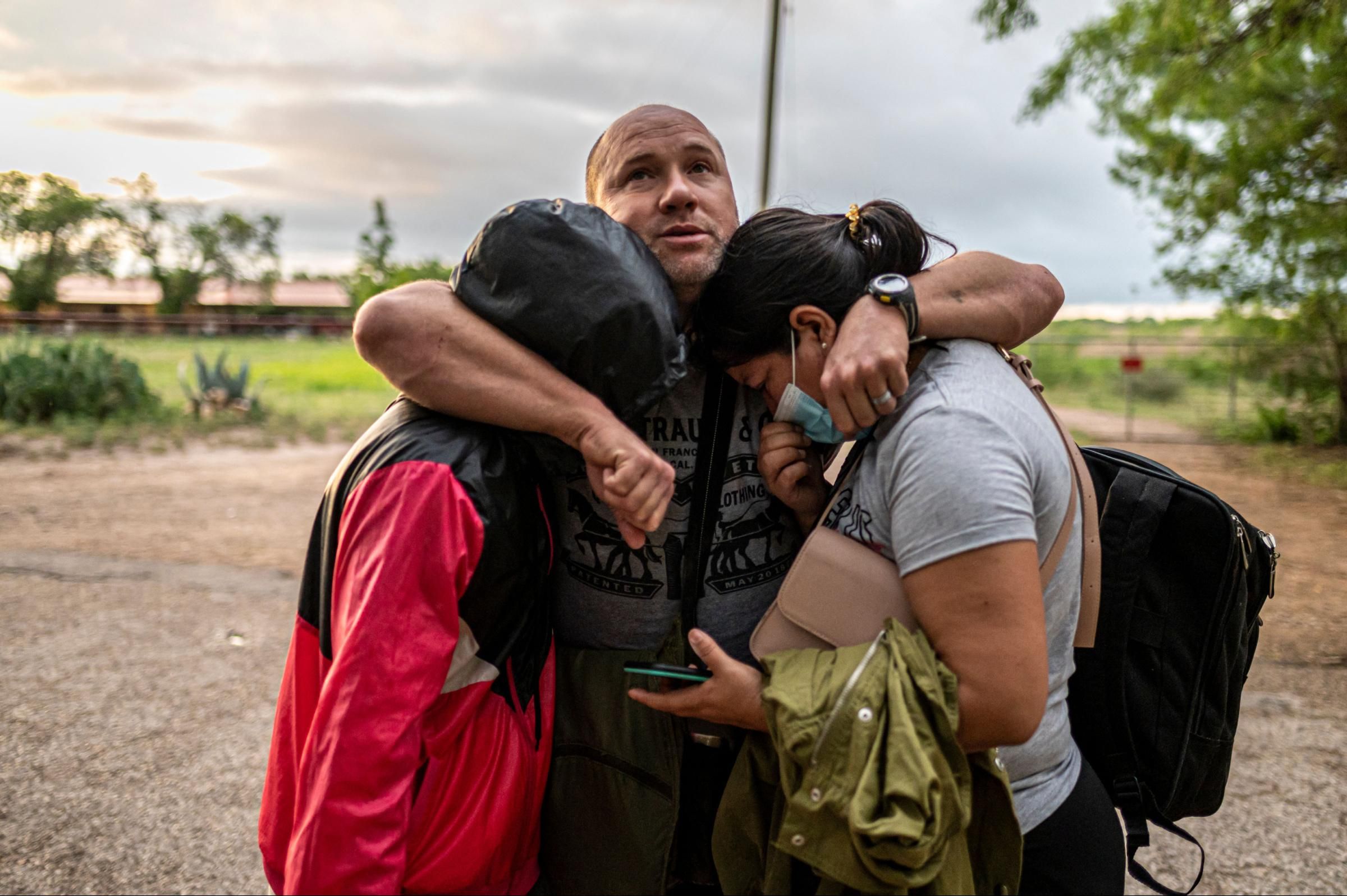 Asylum-seeking migrants' families wait to be escorted by the U.S. Border Patrol after crossing the Rio Grande into the United States from Mexico on May 8, 2021 in Roma, Texas. (Photo: Go Nakamura/Getty Images)