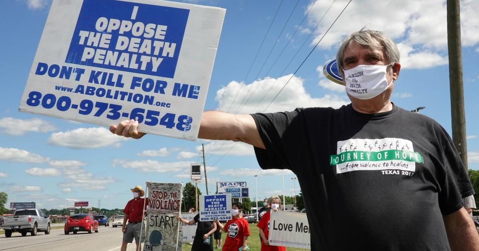 Bill Pelke of Anchorage, Alaska expresses his opposition to the death penalty during a protest near the Federal Correctional Complex in Terre Haute, Indiana where Daniel Lewis Lee was scheduled to be executed on July 13, 2020. Lee was ultimately killed the following morning after an overnight decision from the U.S. Supreme Court. (Photo: Scott Olson/Getty Images)