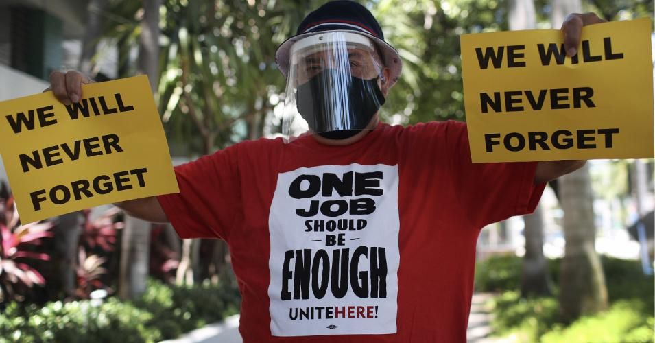Julio Erte joined other workers at an event in Miami Beach organized as part of a national "Strike for Black Lives" to protest systemic racism and economic inequality that they feel has worsened during the coronavirus pandemic on July 20, 2020. (Photo: Joe Raedle/Getty Images)
