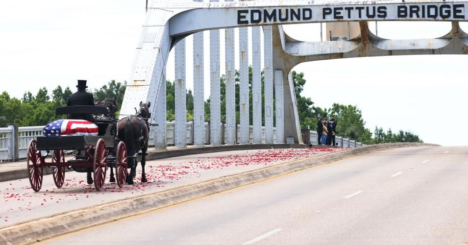 A horse-drawn carriage carrying the body Rep. John Lewis (D-Ga.) crosses the Edmund Pettus Bridge on July 26, 2020 in Selma, Alabama. (Photo: Michael M. Santiago/Getty Images)