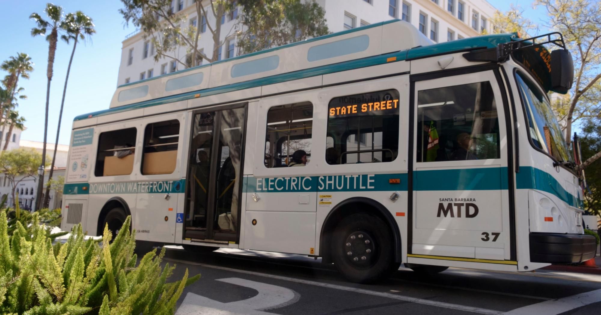 An electric shuttle bus travels through downtown Santa Barbara, California. (Photo: Jumping Rocks/Education Images/Universal Images Group via Getty Images)