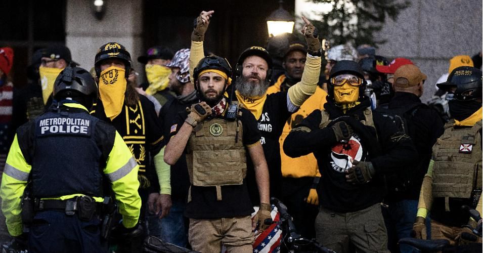 Members of the Proud Boys and Antifa stand off near Black Lives Matter Plaza on December 12, 2020 in Washington, D.C. Thousands of protesters who refuse to accept that President-elect Joe Biden won the election rallied ahead of the electoral college vote to make Trump's 306-to-232 loss official. (Photo: Tasos Katopodis/Getty Images)