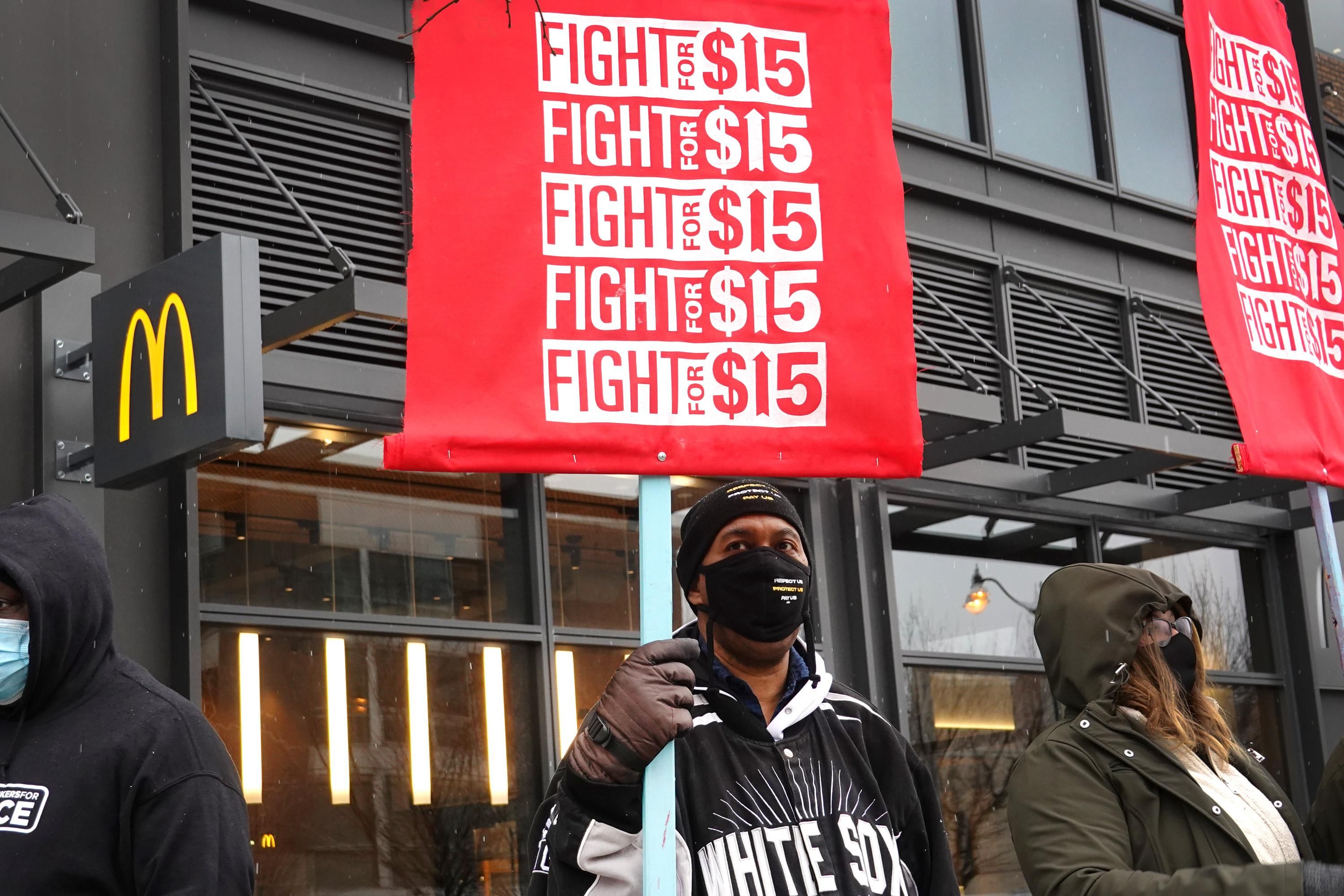 Demonstrators gathered outside of McDonald's corporate headquarters on January 15, 2021 in Chicago. The protest was part of a nationwide effort calling for the minimum wage to be raised to $15-per-hour. (Photo: Scott Olson/Getty Images)