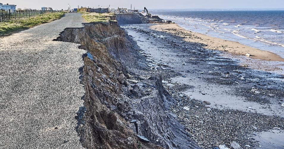 A road on United Kingdom's Holderness Coast is collapsing into the sea due to sea level rise. (Photo: Matthew J. Thomas/Getty Images)