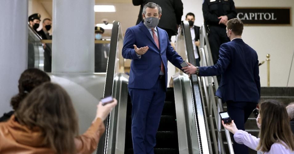 Sen. Ted Cruz (R-Texas) talks with reporters on his way to the U.S. Capitol on the third day of former President Donald Trump's impeachment trial on February 11, 2021 in Washington, D.C. (Photo: Chip Somodevilla/Getty Images)