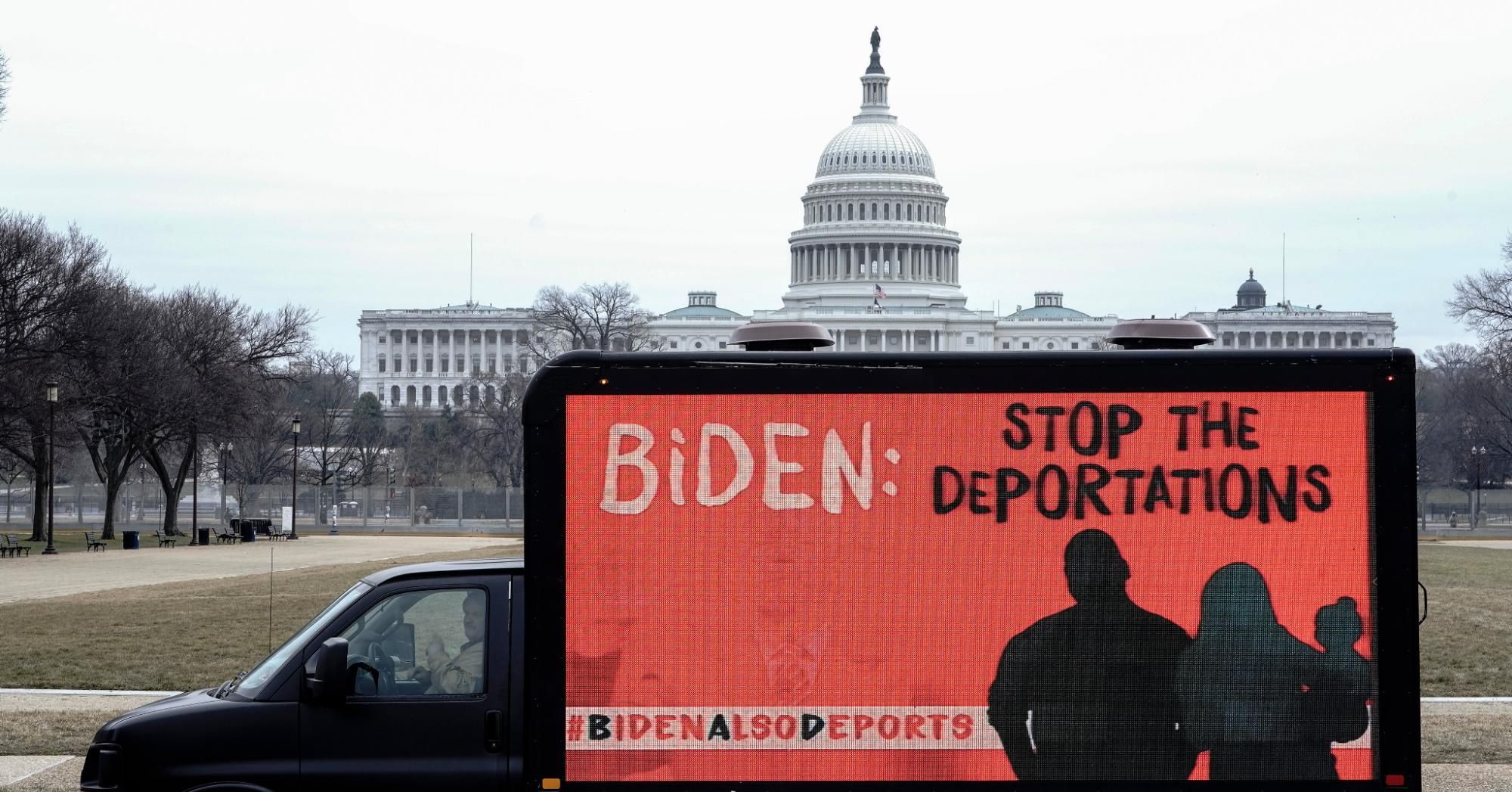 An LED truck displaying messages denouncing mass deportations of immigrants drives past the U.S. Capitol Building on February 15, 2021 in Washington, D.C.