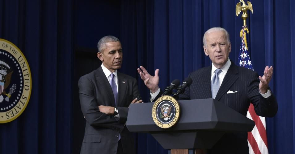Joe Biden speaks alongside Barack Obama during a signing ceremony on December 13, 2016 in Washington, D.C.