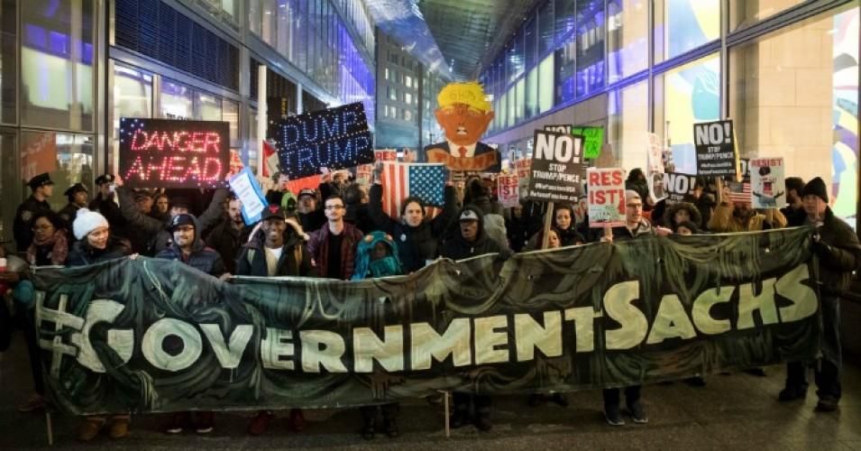 Activists rally against President Donald Trump's reported plans to loosen Wall Street Regulations and repeal the Dodd-Frank Act outside of Goldman Sachs headquarters in Lower Manhattan, February 7, 2017 in New York City. (Photo: Drew Angerer/Getty Images)
