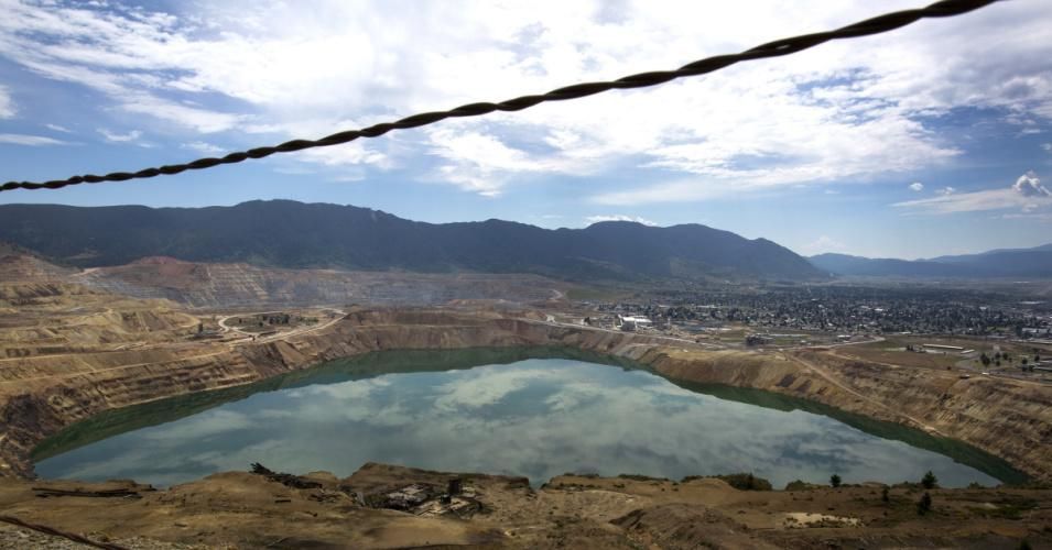 Formerly an open pit copper mine, the Berkeley Pit in Butte, Montana is now part of the largest Superfund site in the United States. (Photo: Janie Osborne/Getty Images)