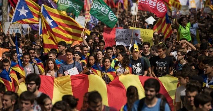 Students gather as they demonstrate against the position of the Spanish government to ban the Self-determination referendum of Catalonia during a university students strike on September 28, 2017 in Barcelona, Spain.