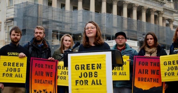 Lauren Maunus of the Sunrise Movement speaks at a press conference Friday announcing the growing support for the Green New Deal. (Photo: Emelia Gold)