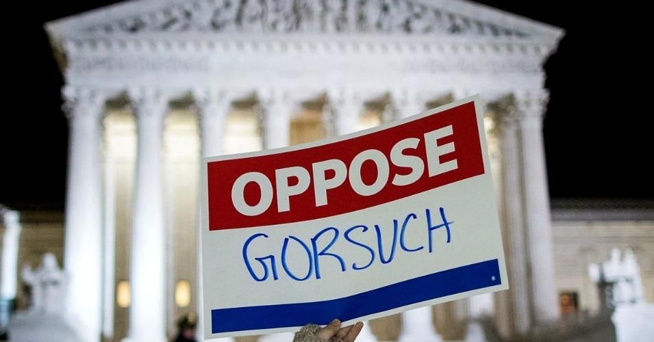 A sign at a protest on the Supreme Court steps against right-wing Judge Neil Gorsuch. 
