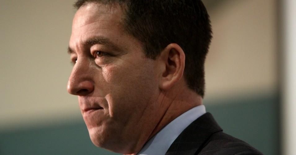 Journalist Glenn Greenwald was charged with cybercrimes Tuesday by the Brazilian government.