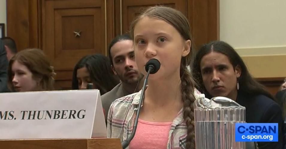 Swedish environment activist Greta Thunberg (L) speaks as This Is Zero Hour co-founder Jamie Margolin (C) and Alliance for Climate Education fellow Vic Barrett (R) look on during a joint hearing before the House Foreign Affairs Committee, Europe, Eurasia, Energy and the Environment Subcommittee, and the House Select Committee on the Climate Crisis, at the Rayburn House Office Building on Capitol Hill in Washington, DC, on September 18, 2019. (Photo: Alastair Pike/AFP/Getty Images)