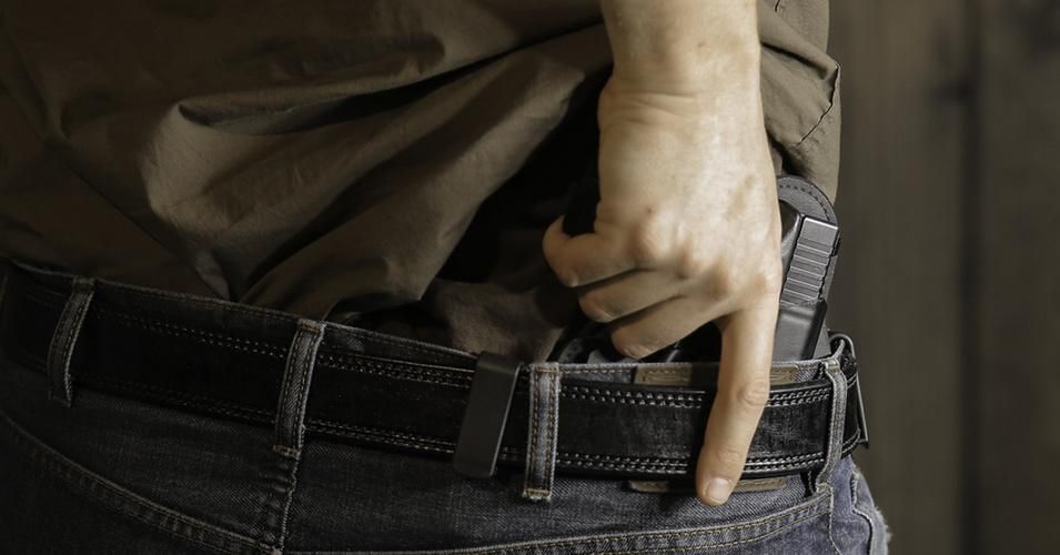 A man carries a handgun in a concealed holster. (Photo: Ibro Palic/Flickr/c