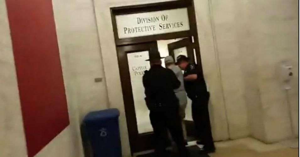 Public News Service reporter Dan Heyman was arrested in the West Virginia State Capitol. 