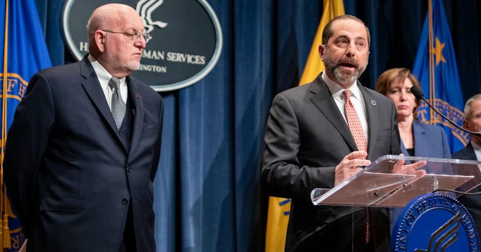U.S. Health Secretary Alex Azar (R) speaks at a January 28, 2020 news conference on the emerging Covid-19 crisis as CDC Director Robert Redfield stands by. (Photo: Samuel Corum/Getty Images)
