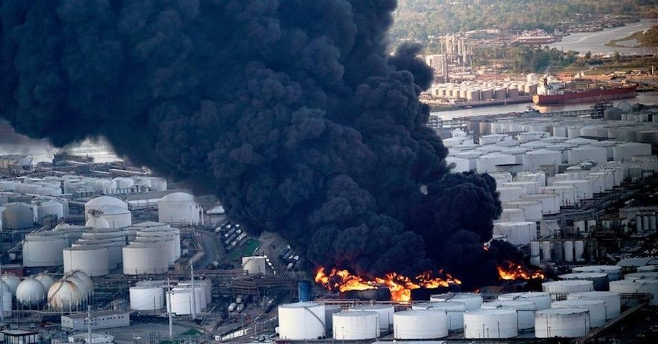 A plume of smoke rises from a petrochemical fire at the Intercontinental Terminals Company Monday, March 18, 2019, in Deer Park, Texas. 