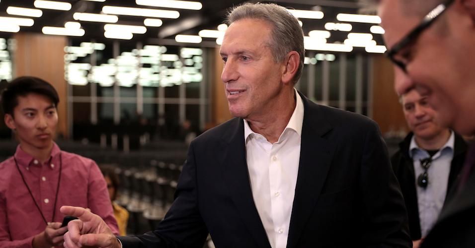 Howard Schultz speaking with the media at Arizona State University in January.