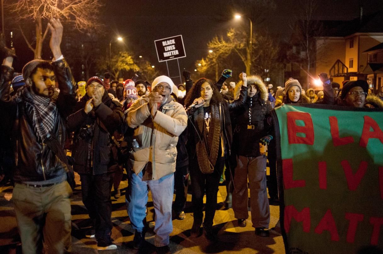 Mica Grimm, center (carrying microphone), a member of Black Lives Matter, leads a march from a makeshift memorial for Jamar Clark on the side of Plymouth Avenue several blocks from the 4th Precinct November 20, 2015 in North Minneapolis, Minnesota. (Photo: Stephen Maturen/Getty Images)
