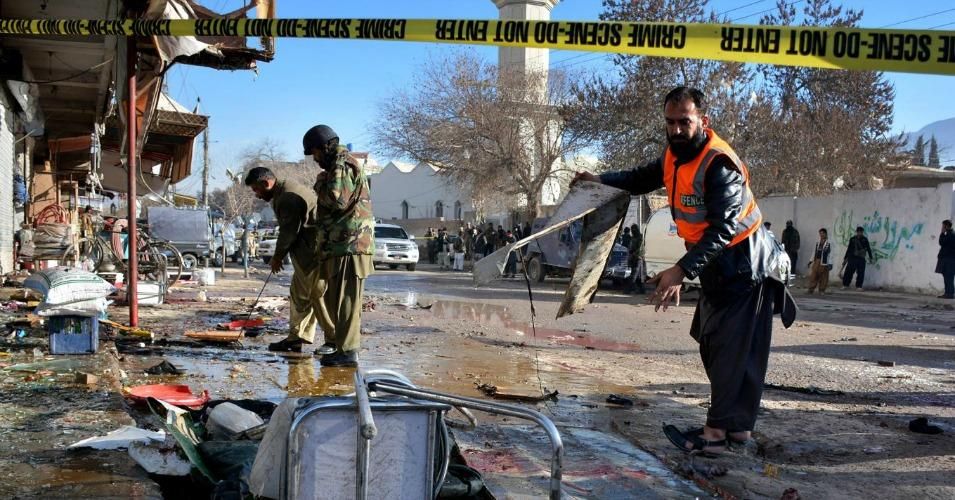 Pakistani security officials examine at the site of suicide bombing in Quetta, Pakistan. (Photo: AP)