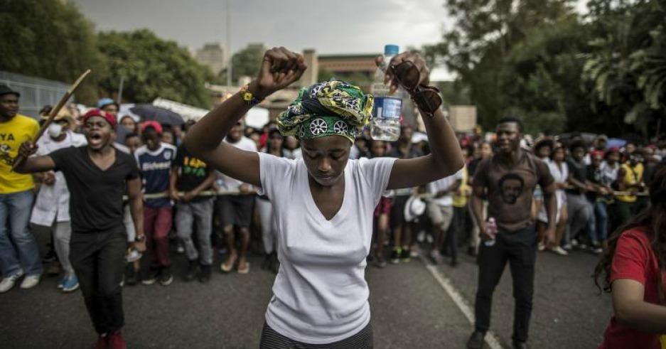 Student organizer Nompendulo Mkatshwa marched through the campus of the University of the Witwatersrand in Johannesburg on Wednesday. (Photo: AFP/Getty)