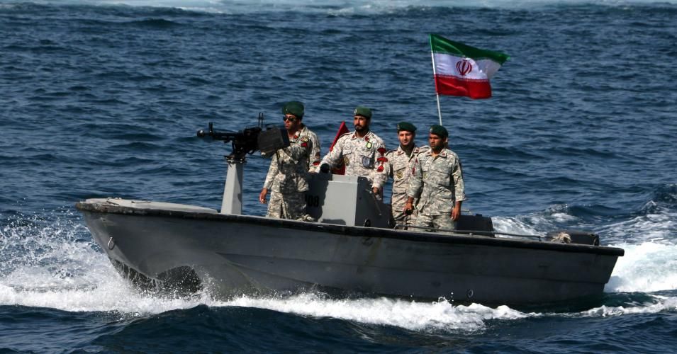 Iranian soldiers take part in the "National Persian Gulf day" in the Strait of Hormuz, on April 30, 2019. The date coincides with the anniversary of a successful military campaign by Shah Abbas the Great of Persia in the 17th century, which drove the Portuguese navy out of the Hormuz Island, after which is named the waterway which separates the Gulf from the Sea of Oman. (Photo: Atta Kenare/AFP/Getty Images)
