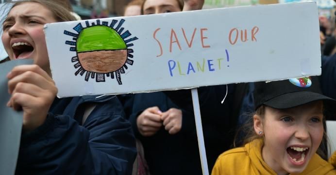 Irish schools students during the Global School Strike for Climate Action march from St. Stephen's Green to Leinster House, demanding an immediate action on climate change
