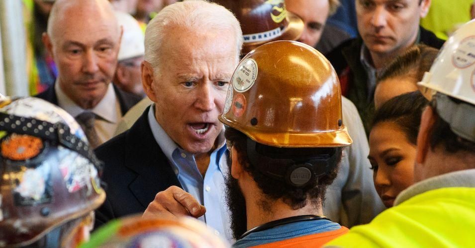 Democratic presidential candidate Joe Biden meets workers and discusses gun rights as he tours the Fiat Chrysler plant in Detroit, Michigan on March 10, 2020. 