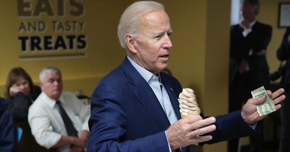 Democratic presidential candidate and former Vice President Joe Biden eats ice cream at the The Cone Shoppe while campaigning on April 30, 2019 in Monticello, Iowa.