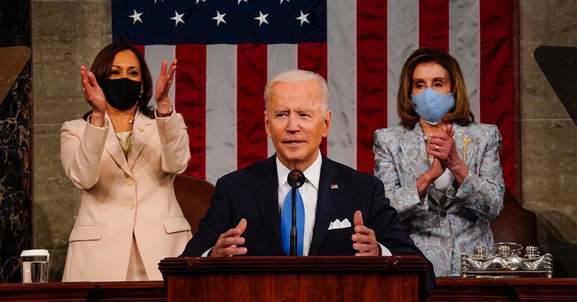 President Joe Biden addresses a joint session of Congress, with Vice President Kamala Harris and House Speaker Nancy Pelosi (D-Calif.) on the dais behind him, on April 28, 2021 in Washington, D.C.