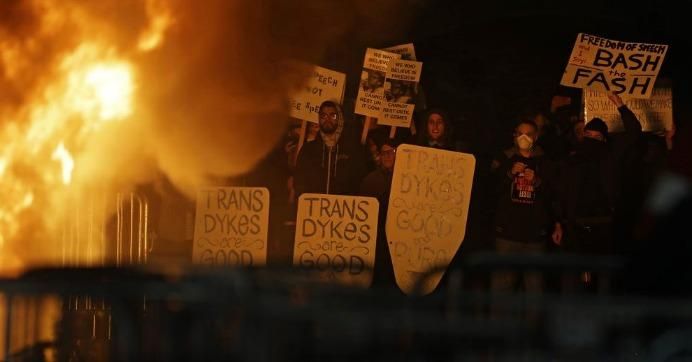 Chanting "No Milo, no Trump, no fascist USA," roughly 1,500 people turned out to protest Yiannopoulos, who has gained notoriety for inflammatory writings and statements against women, Muslims, and LGBTQ people. (Photo: Los Angeles Times)