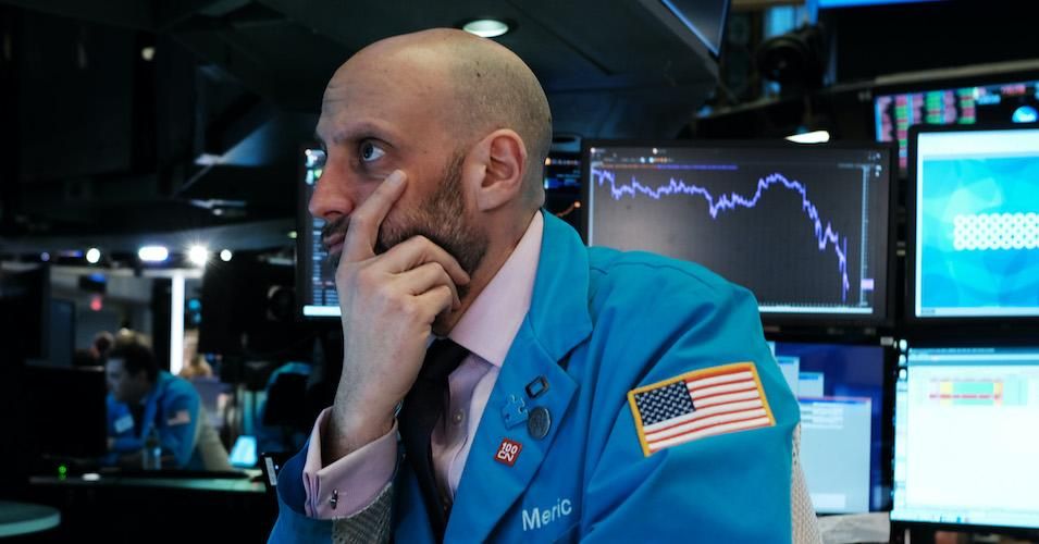 Traders work on the floor of the New York Stock Exchange on March 09, 2020 in New York City watch as the Dow Jones Industrial Average fell more than 2,000 points.