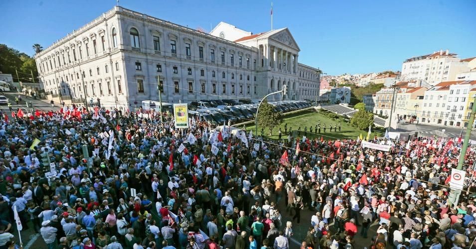 Anticipating the anti-austerity takeover, a crowd gathers outside of Parliament in Lisbon, Portugal. (Photo: Joao Profirio/EPA)