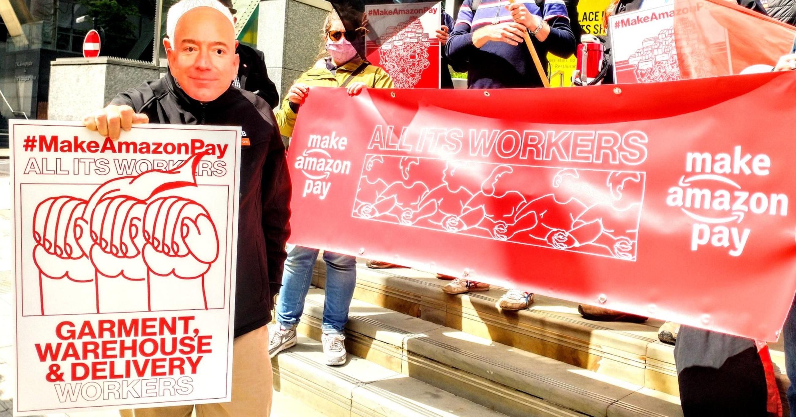 Members of Britain's GMB Union demonstrate outside Amazon's United Kingdom headquarters on May 26, 2021 as part of a #MakeAmazonPay global day of action for workers' rights. (Photo: War on Want/Twitter)