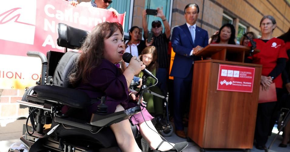 Maria Isabel Bueso, 24, speaks during a protest outside of UCSF Benioff Children's Hospital on September 06, 2019 in Oakland, California. 
