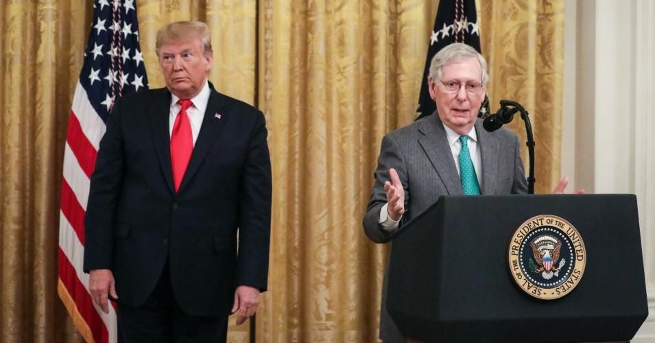 President Donald Trump looks on as Senate Majority Leader Mitch McConnell (R-Ky) speaks during an event about judicial confirmations in the East Room of the White House on November 6, 2019 in Washington, D.C.