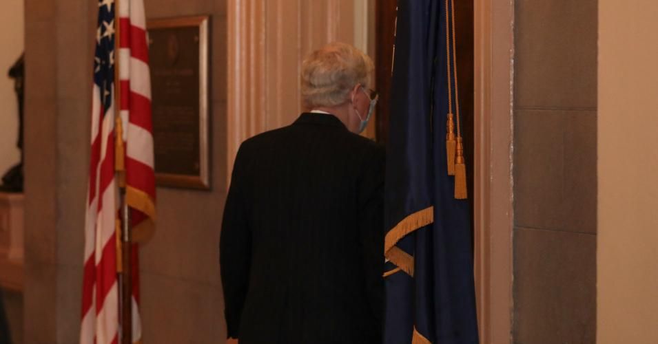 Senate Majority Leader Mitch McConnell (R-Ky.) walks to his office after leaving the Senate Floor at the U.S. Capitol on December 21, 2020 in Washington, D.C.